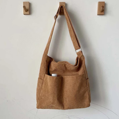 Axelväska i canvas med kottmönster – Avslappnad och elegant stil