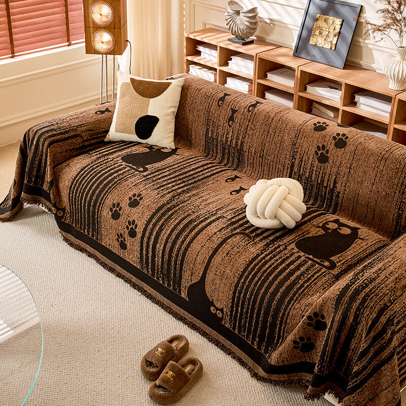 Non-slip Sofa Cover with Paw Print Pattern – Protection and Comfort 